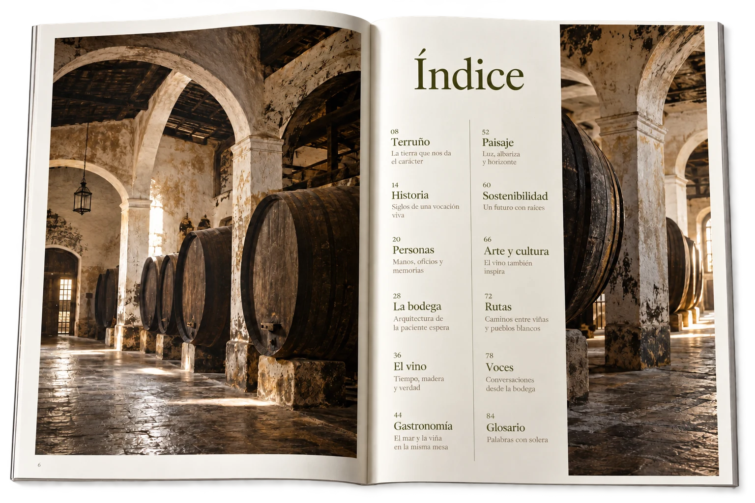Revista abierta por el índice, con fotografía de una bodega tradicional